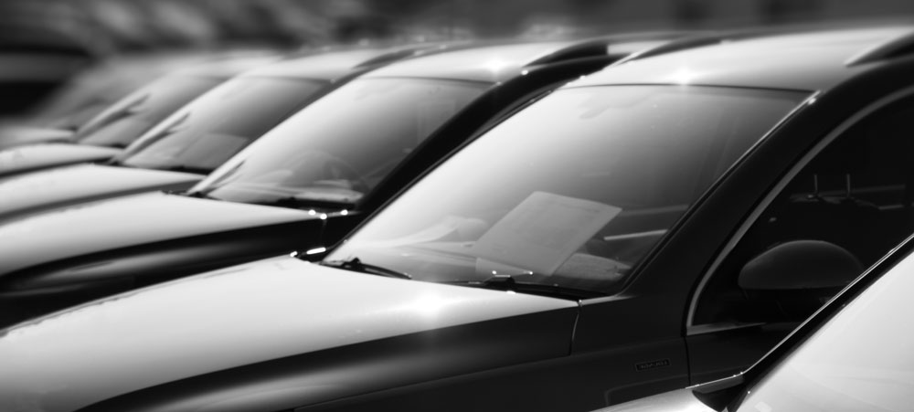 New Cars Parked Outside Awaiting Delivery